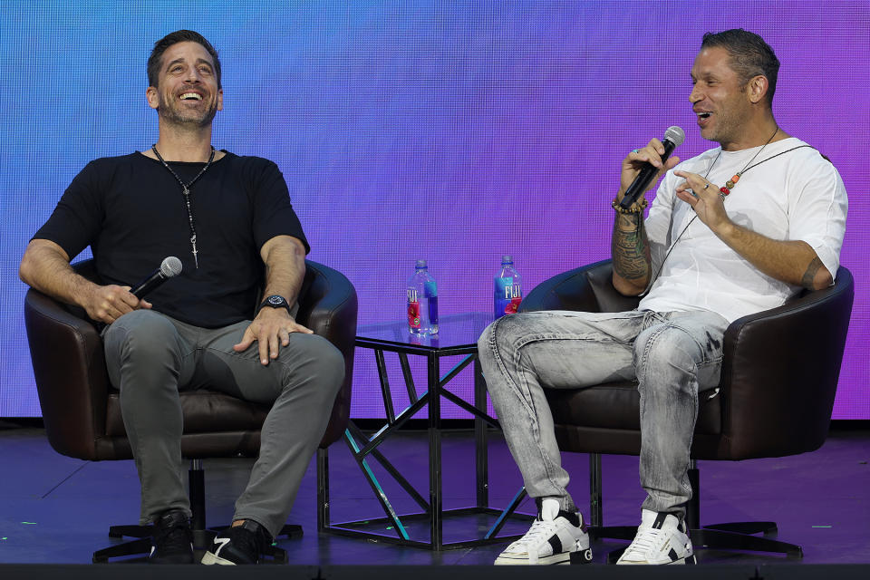 DENVER, COLORADO - JUNE 21: NFL Quarterback Aaron Rodgers participates in a talk with author Aubrey Marcus as part of Psychedelic Science 2023 in the Bellcor Theatre of the Colorado Convention Center on June 21, 2023 in Denver, Colorado. (Photo by Matthew Stockman/Getty Images)