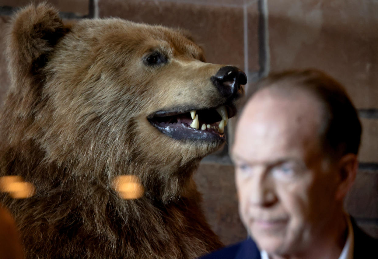 David Malpass, president of the World Bank Group, looks on next to a stuffed grizzly bear at Teton National Park, where financial leaders from around the world gathered for the Jackson Hole Economic Symposium, outside Jackson, Wyoming, U.S., August 26, 2022. REUTERS/Jim Urquhart