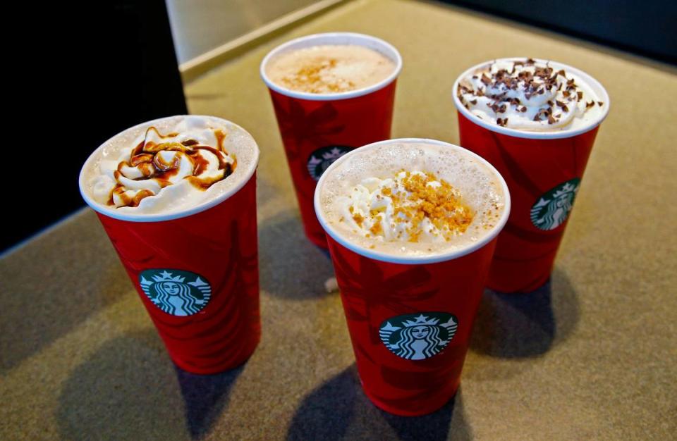 This Monday, Nov. 24, 2014 photo shows four limited-time Starbucks coffee drinks, clockwise from left, the Gingerbread Latte, the Eggnog Latte, the Peppermint Mocha, and the new Chestnut Praline Latte, at a Starbucks store in Seattle. Starbucks is one of many businesses that roll out a number of limited-time flavors around the holidays. (AP Photo/Ted S. Warren)