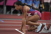 Allyson Felix, of the United States, prepares to start in a semifinal of the women's 400-meters at the 2020 Summer Olympics, Wednesday, Aug. 4, 2021, in Tokyo. (AP Photo/Matthias Schrader)