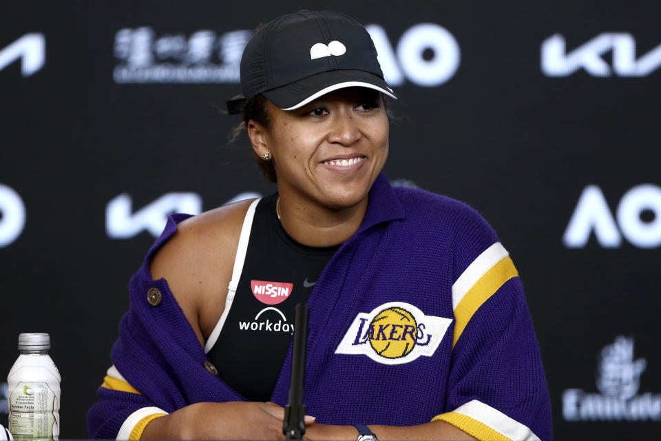 Japan's Naomi Osaka smiles during a press conference following her semifinal win over United States' Serena Williams at the Australian Open tennis championship in Melbourne, Australia, Thursday, Feb. 18, 2021.(Rob Prezioso/Tennis Australia via AP)