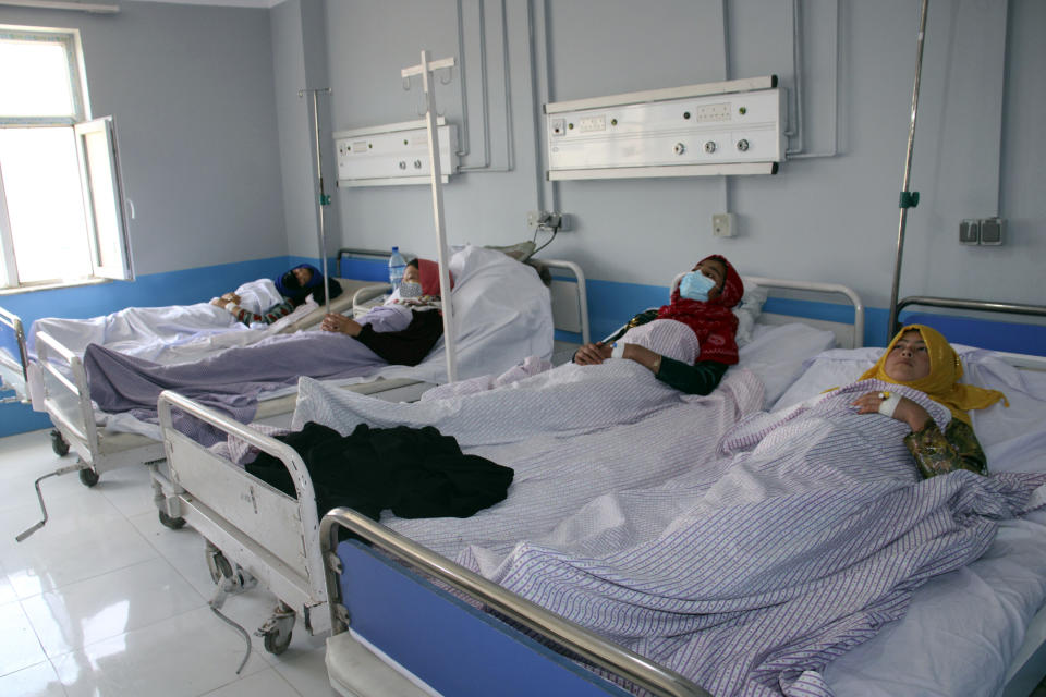 Afghan schoolgirls receive treatment for suspected poisoning, at a hospital in Sar-e-Pul province in northern, Afghanistan, Monday, June 5, 2023. An education official in northern Afghanistan says nearly 80 girls at two primary schools have been poisoned in a targeted campaign. It is thought to be the first time this kind of assault has happened since the Taliban swept to power in August 2021 and began their crackdown on the rights and freedoms of Afghan women and girls. (AP Photo)