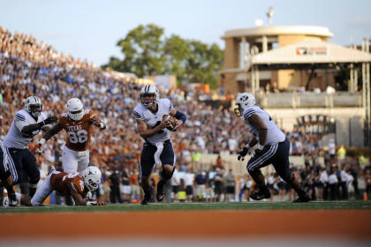 QB Taysom Hill ran for three touchdowns in BYU's win over Texas. (USA Today)