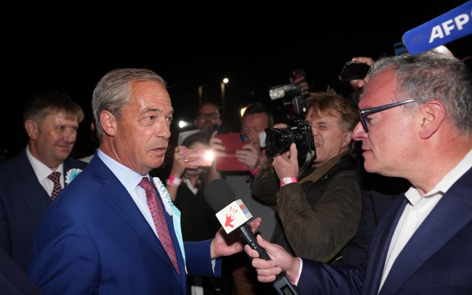 Nigel Farage arrives at the count in Clacton