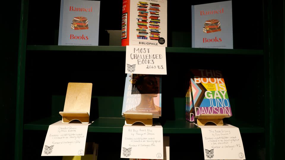 The top 10 banned books in the US are shelved in numerical order at the Lynx. The most frequently banned book, "Gender Queer," sold out on opening day. - Octavio Jones for CNN
