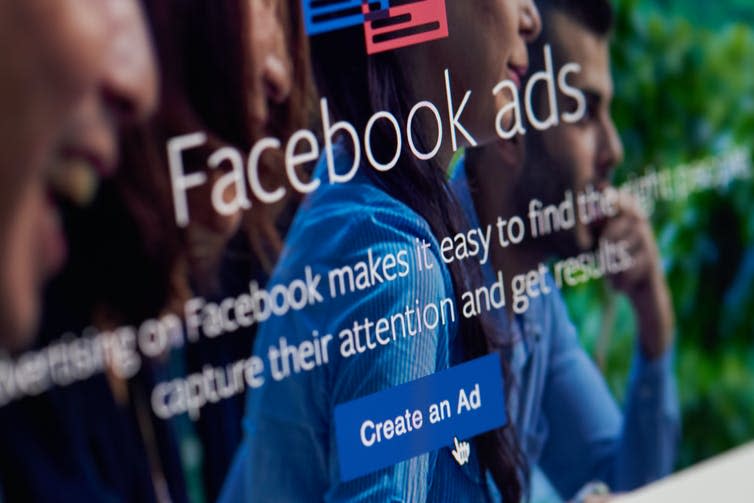 A close-up of a screen offering Facebook adverts