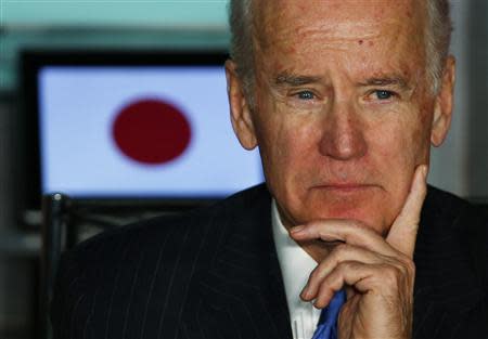 U.S. Vice President Joe Biden meets with Japanese business leaders at the headquarters of internet commerce and mobile games provider DeNA Co. in Tokyo December 3, 2013. REUTERS/Toru Hanai