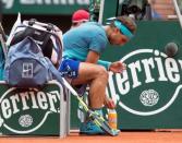 May 26, 2016; Paris, France; Rafael Nadal (ESP) at a change of ends during his match against Facundo Bagnis (ARG) on day five of the 2016 French Open. Mandatory Credit: Susan Mullane-USA TODAY Sports