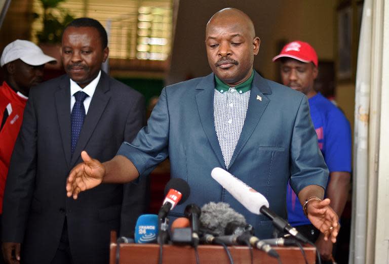 Burundi President Pierre Nkurunziza talks to the media at the President's office in Bujumbura on May 17, 2015 in his first official appearance since an attempted coup