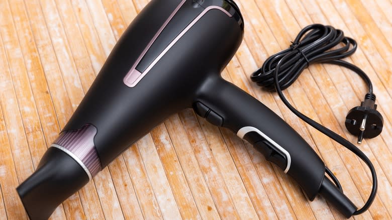 Hairdryer on a wooden table