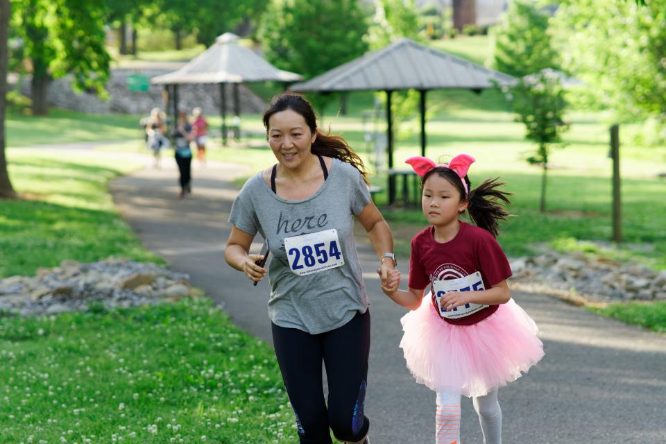 Participants in this year’s 2nd Annual Knoxville Asian Festival Year of the Mouse 5K & 1 Mile Virtual Run are encouraged to smile, wearing costumes and submit pictures, just like these runners from last year’s race! May 4, 2019.