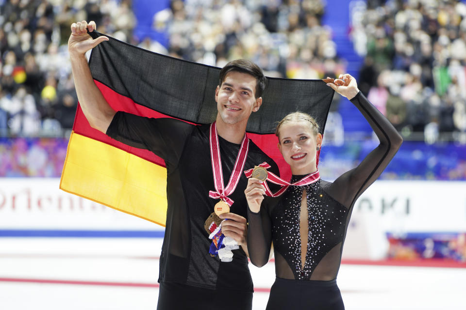 Minerva Fabienne Hase and Nikita Volodin of Germany pose after the award ceremony for the pair's free skating during the ISU Grand Prix of Figure Skating - NHK Trophy in Kadoma, near Osaka, Japan, Saturday, Nov. 25, 2023. (AP Photo/Tomohiro Ohsumi)