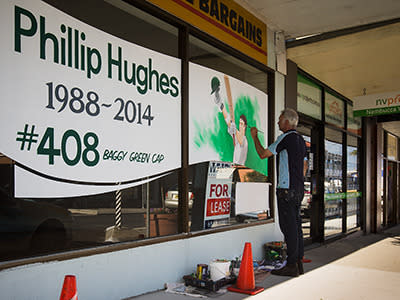 A store in Sydney honours Hughes with a portrait in the shopfront