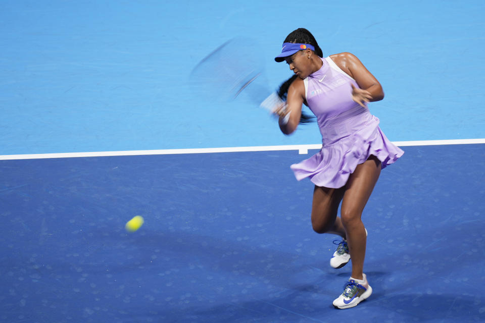 Naomi Osaka of Japan returns a shot against Daria Saville of Australia during a singles match in the Pan Pacific Open tennis tournament in Tokyo, Tuesday, Sept. 20, 2022. Saville retired with a knee injury in the second game of their contest. (AP Photo/Hiro Komae)