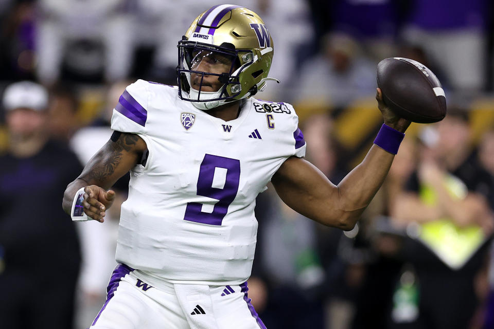 HOUSTON, TEXAS - JANUARY 08: Michael Penix Jr. #9 of the Washington Huskies throws the ball in the first quarter against the Michigan Wolverines during the 2024 CFP National Championship game at NRG Stadium on January 08, 2024 in Houston, Texas. (Photo by Maddie Meyer/Getty Images)