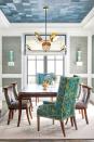 <p>Two floating cubic shelves function as pedestals to prop up vases in this colorful dining room designed by <a href="https://coreydamenjenkins.com/" rel="nofollow noopener" target="_blank" data-ylk="slk:Corey Damen Jenkins;elm:context_link;itc:0;sec:content-canvas" class="link ">Corey Damen Jenkins</a>. This trick is perfect for a narrow wall in a dining room, hallway, or entry. </p>