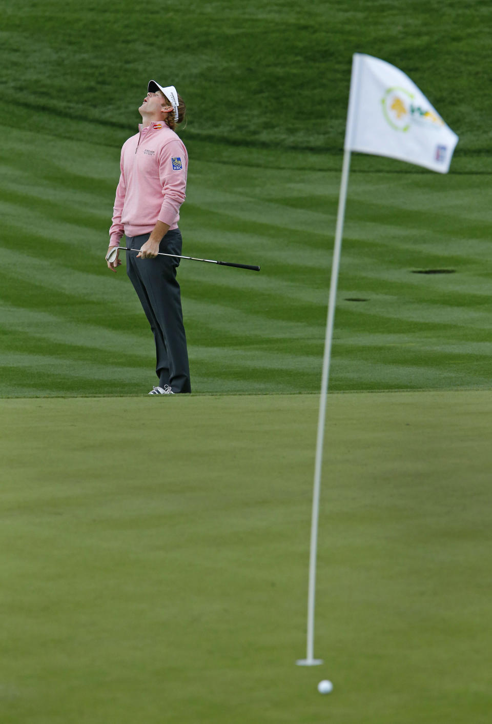 Brandt Snedeker reacts after narrowly missing his putt on the ninth green during the second round of the Phoenix Open golf tournament Friday, Jan. 31, 2014, in Scottsdale, Ariz. (AP Photo/The Arizona Republic, David Kadlubowski) MESA OUT MARICOPA COUNTY OUT MAGS OUT NO SALES