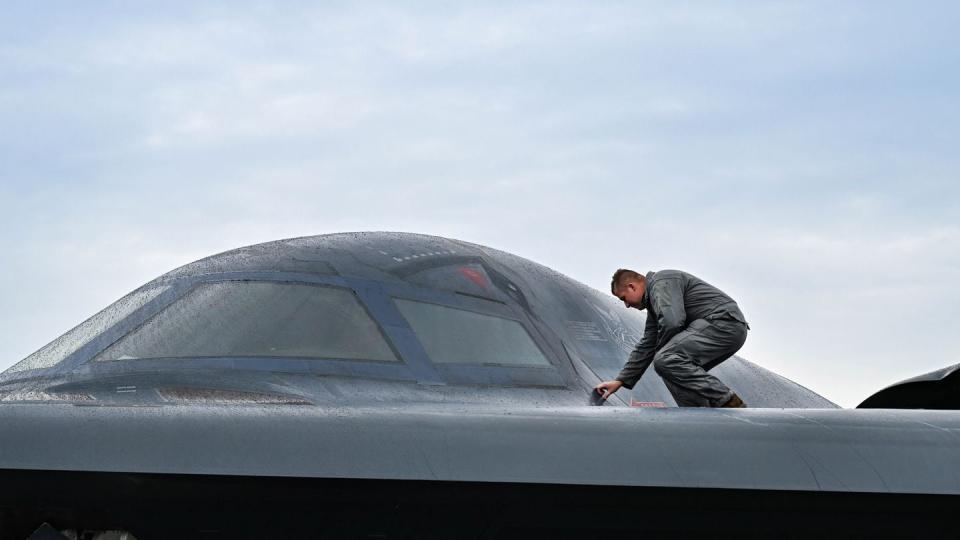 A U.S. Air Force maintainer assigned to the 393rd Expeditionary Bomb Squadron, inspects the low observable skin on a B-2 Spirit during Bomber Task Force 23-4, in Keflavik, Iceland, Aug. 18. (Tech. Sgt. Heather Salazar/Air Force)