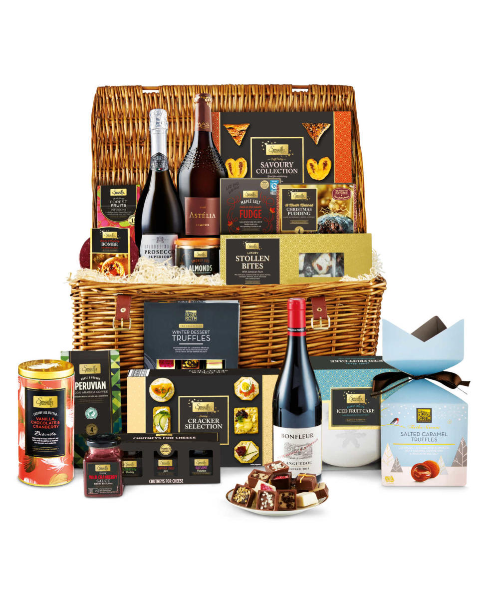 <p>The Christmas Feast hamper comes in at just £84.99, and again is presented in a wonderful wicker basket. Included is a selection of biscuits for cheese, stollen bites, a 18-month matured Christmas pudding, a selection of truffles, an iced fruit cake, fudge, three bottles of plonk, including a Prosecco, and a chutney gift set. </p>