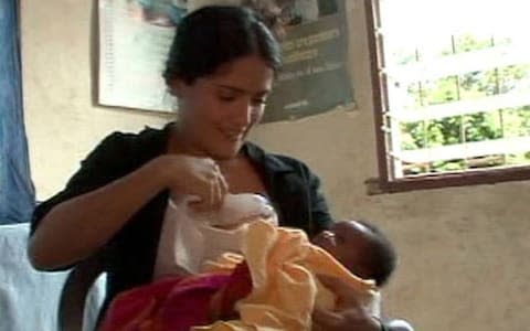 Actress Salma Hayek breastfed a sick baby on a 2009 charity trip to Sierra Leone - Credit: ABC News