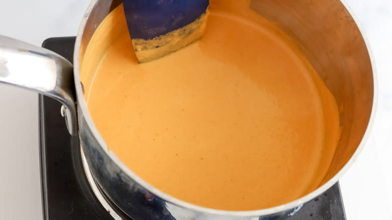 pumpkin filling heating in saucepan