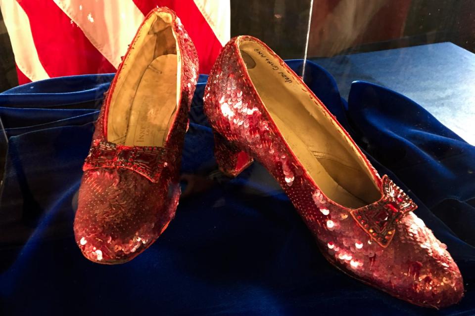 A pair of ruby slippers once worn by actress Judy Garland in the The Wizard of Oz (AP)