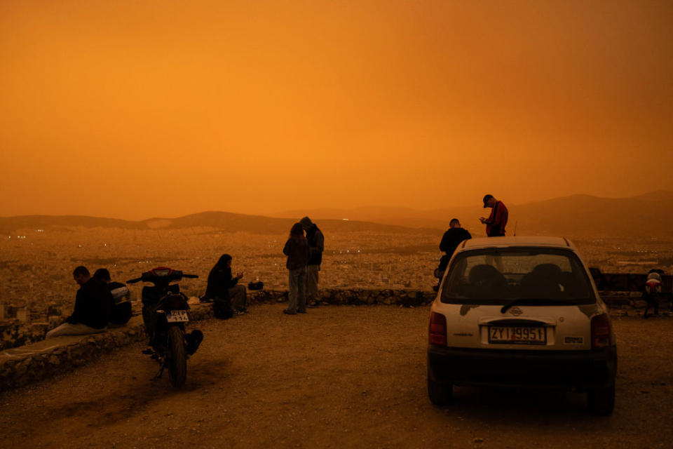 Clouds of dust blown in from the Sahara covered Athens and other Greek cities on April 23, 2024, in one of the worst such episodes to hit the country since 2018, officials said. <span class="copyright">Angelos Tzortzinis—Getty Images</span>