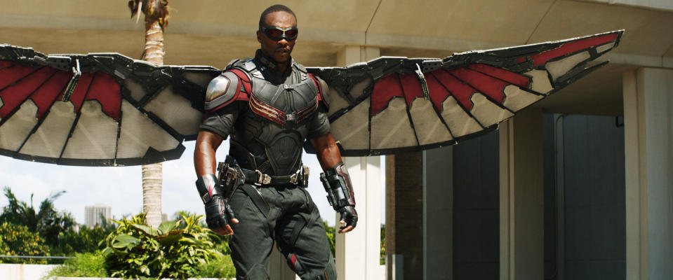 Anthony Mackie dressed as the Falcon, in a detailed suit with mechanical wings, from a scene in a movie