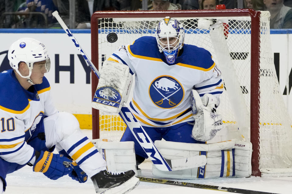Buffalo Sabres goaltender Devon Levi (27) makes a save during the first period of an NHL hockey game against the New York Rangers, Monday, April 10, 2023, in New York. (AP Photo/John Minchillo)