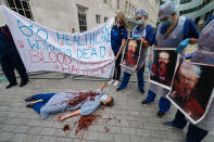 NHS staff stage a die-in outside BBC Broadcasting House to draw attention to 640 workers who died of Covid-19 before marching to Trafalgar Square through central London to demand 15% pay rise for NHS workers on 12 September, 2020 in London, England. Protesters demonstrate against not being included in the government's pay deal for 900,000 public sector workers amid the sacrifices and hardship experienced during the coronavirus pandemic. (Photo by WIktor Szymanowicz/NurPhoto via Getty Images)