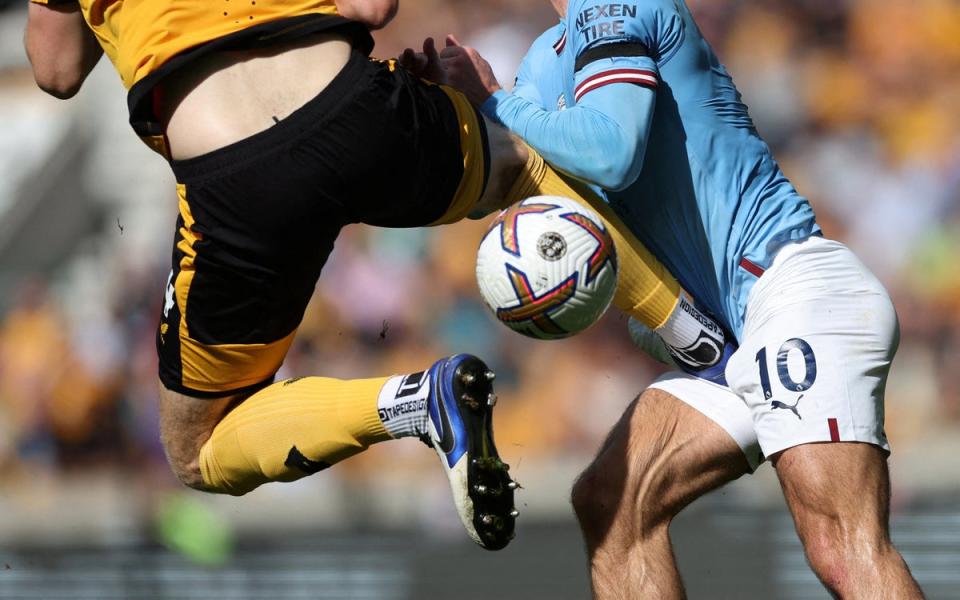 17 September 2022: Wolverhampton Wanderers’ Nathan Collins fouls Manchester City’s Jack Grealish leading to a red card. City went on to win the match at Molineux Stadium three goals to nil. (Action Images/Reuters)