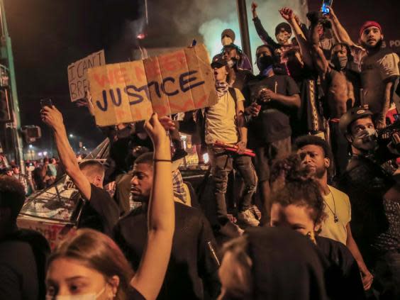 Protesters gather outside Minneapolis Police Department (EPA)