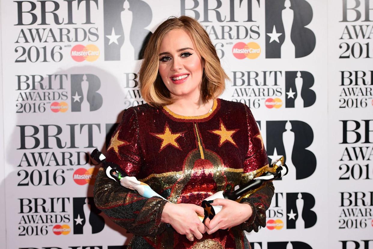 Award winners: Adele with her gongs at the 2016 ceremony: Ian West/PA