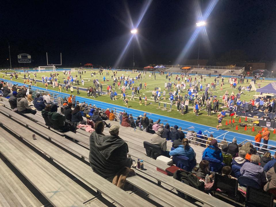 Fans watch track and field action during Joe Sanford's McDowell Invitational, held April 26, 2024, at Gus Anderson Field.