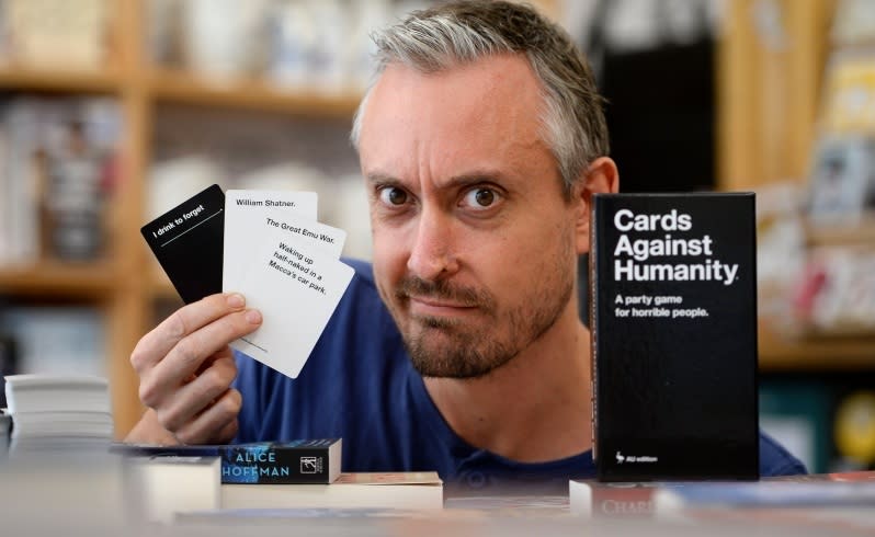 Sam Baker with the game Cards Against Humanity. Picture: Ian Munro/The West Australian