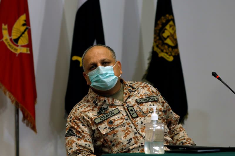 Director General Rangers Sindh Major General Omer Bukhari, attends a joint news conference, following an attack on the Pakistan Stock Exchange, Karachi