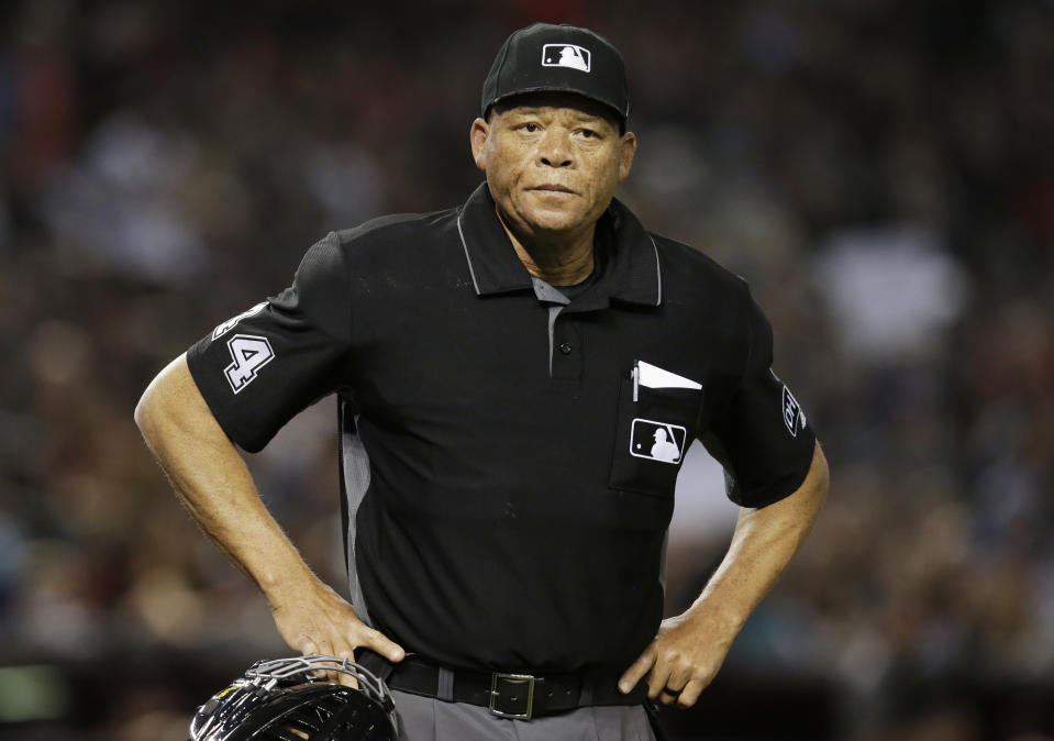 ADDS THE INFORMATION IS FROM ANONYMOUS SOURCE - FILE - In this June 2, 2018, file photo, Major League baseball umpire Kerwin Danley (44) is shown during the first inning of a baseball game between the Arizona Diamondbacks and the Miami Marlins in Phoenix. Major League Baseball has appointed its first African American umpire crew chief, promoting Kerwin Danley to the position this week, The Associated Press has learned. A person familiar with the move spoke to the AP on Wednesday, Feb. 26, 2020 on condition of anonymity because the announcement had not yet been made. (AP Photo/Rick Scuteri, File)