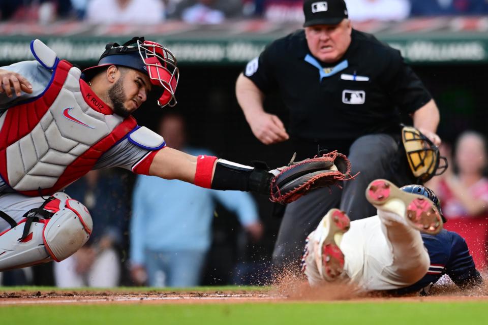 May 31, 2024; Cleveland, Ohio, USA; Washington Nationals catcher Keibert Ruiz (20) can not Mae the tag on Cleveland Guardians shortstop Brayan Rocchio (4) during the third inning at Progressive Field. Mandatory Credit: Ken Blaze-USA TODAY Sports