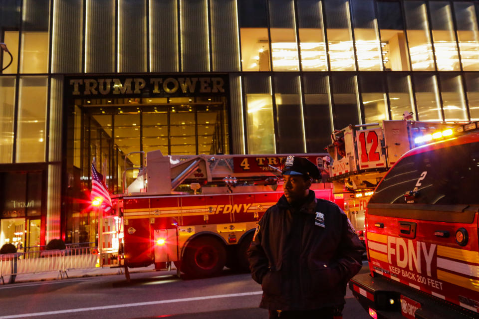 <p>NYPD officers and first responders asses the scene of a fire at Trump Tower on April 7, 2018 in New York City. One person has reportedly died and four firefighters were injured in the four-alarm blaze which broke out on the 50th floor. (Photo: Eduardo Munoz Alvarez/Getty Images) </p>
