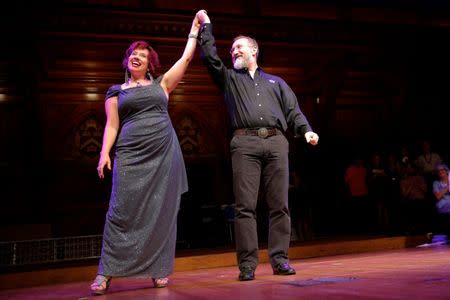 NASA scientists Lisa Danielson (L) and Will Stepanov are celebrated onstage for their wedding anniversary during the 26th First Annual Ig Nobel Prize ceremony at Harvard University in Cambridge, Massachusetts, U.S. September 22, 2016, fifteen years after they were married during an IgNobel prize ceremony. REUTERS/Brian Snyder