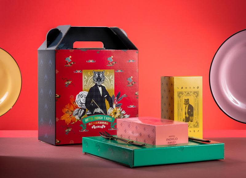 台北大直英迪格酒店推出「虎富滿堂」春節禮盒，外觀設計由英姿挺拔的金虎著歐洲蘇格蘭格紋服飾，延續英迪格著重具設計感、風格獨特的品牌精神。（台北大直英迪格提供）
