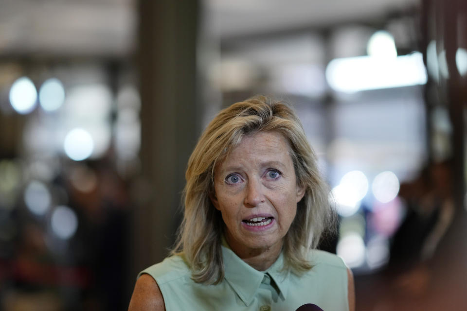 Dutch Defense Minister Kajsa Ollongren speaks with the media as she arrives for a meeting of EU Defense Ministers at the Prague Congress Center in Prague, Czech Republic, Tuesday, Aug. 30, 2022. (AP Photo/Petr David Josek)