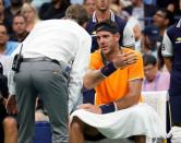 Aug 31, 2018; New York, NY, USA; Juan Martin del Potro of Argentina sits and complains about a fan's calling the ball "out" during play against Fernando Verdasco of Spain in a third round match on day five of the 2018 U.S. Open tennis tournament at USTA Billie Jean King National Tennis Center. Mandatory Credit: Robert Deutsch-USA TODAY Sports