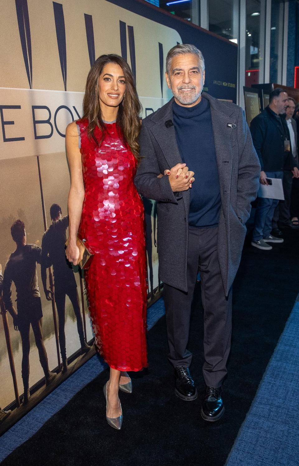 Amal Clooney (L) and George Clooney attend the MGM Seattle community screening of “The Boys In The Boat” at SIFF Cinema in Seattle, Washington on Dec. 7, 2023.