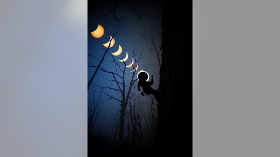 <div>FOX 2 photojournalist Coulter Stuart captured the solar eclipse and the rock climber in separate images, then spliced them together. Photo Credit: Coulter Stuart</div>