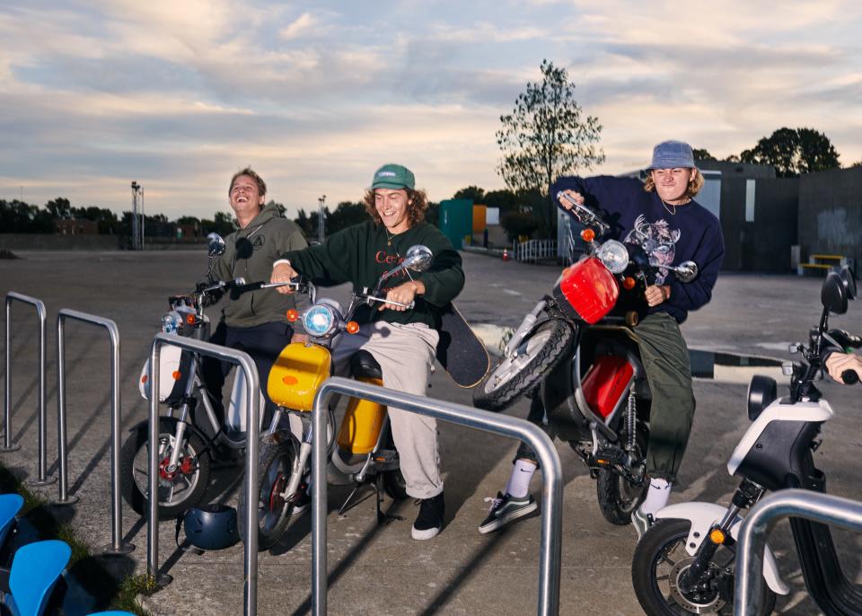 Austin Leleu (center) and friends with their mopeds