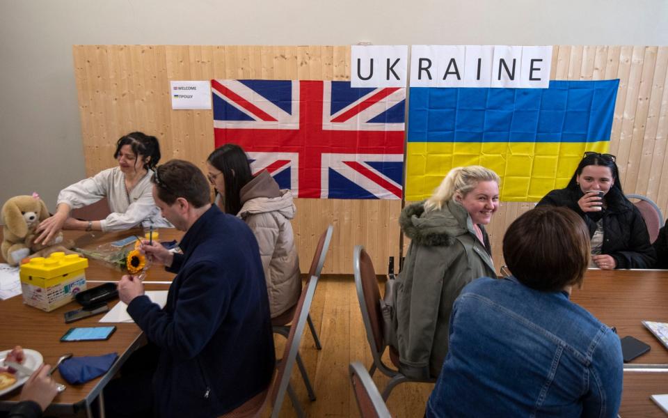 Ukrainian refugees are introduced to their host families in the UK