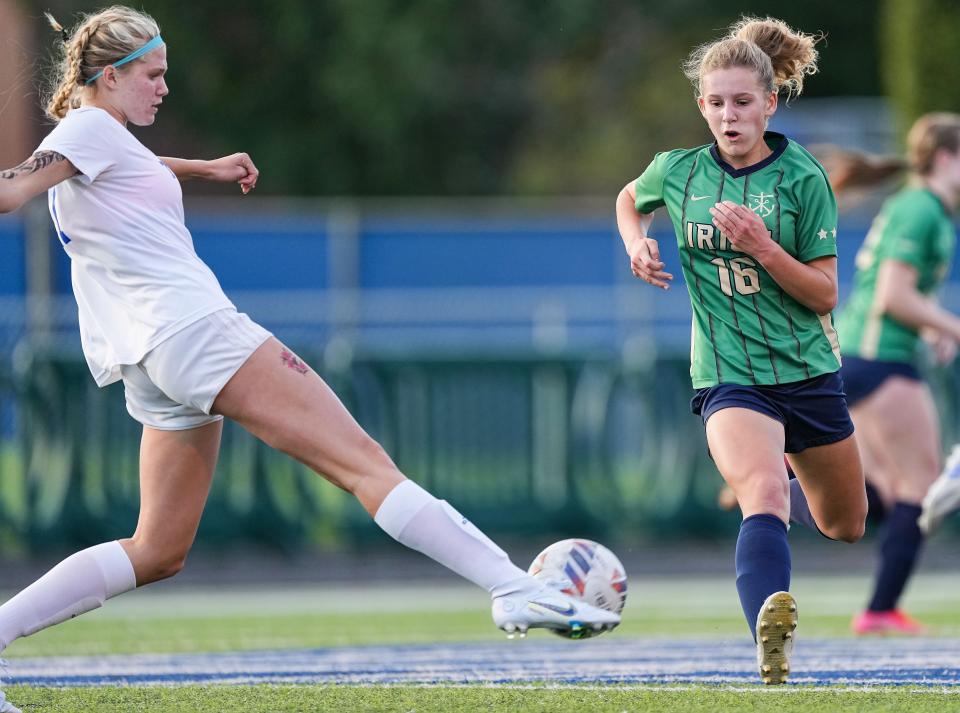 Cathedral Fighting Irish Lauren Robertson (16) rushes after the ball Wednesday, Sept. 28, 2022, at Bishop Chatard High School in Indianapolis.  