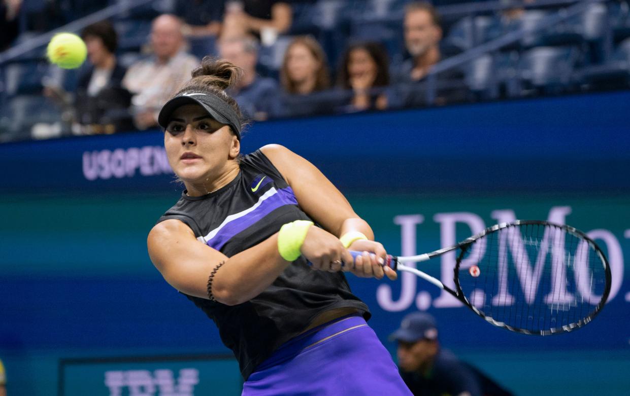 Bianca Andreescu of Canada hits a return against Elise Mertens of Belgium during their women's Singles Quarter-finals match at the 2019 US Open at the USTA Billie Jean King National Tennis Center in New York on September 4, 2019. (Photo by Don Emmert / AFP)        (Photo credit should read DON EMMERT/AFP/Getty Images)