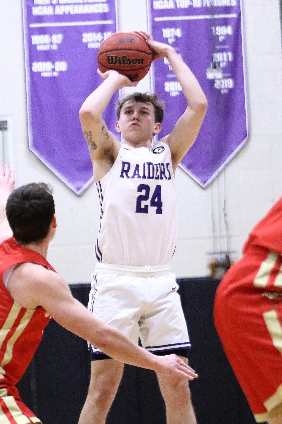 Mount Union's Ethan Stanislawski puts up a shot during OAC action at Mount Union Saturday, January 15, 2022.